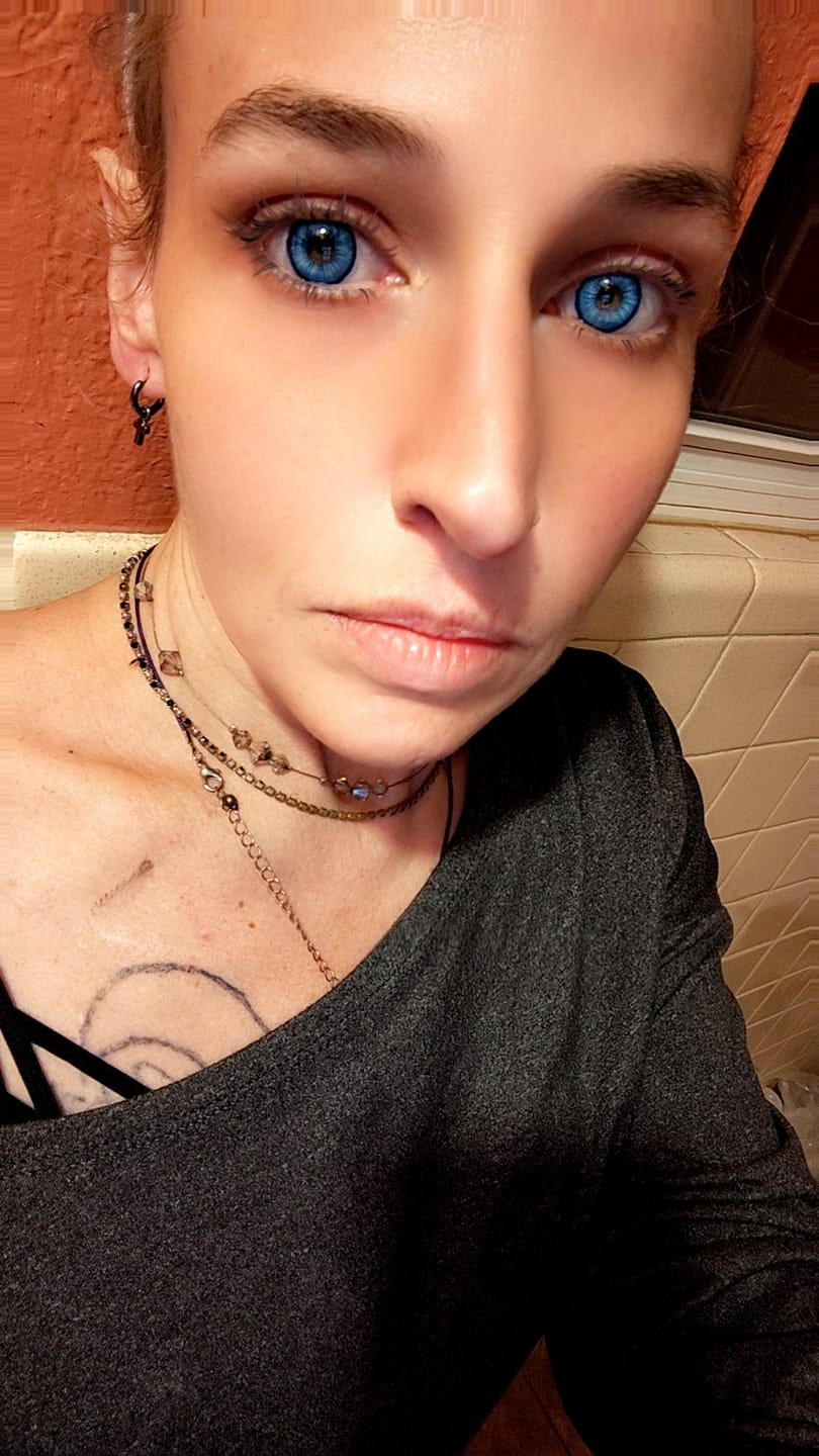Customer photo review of Amaretto Blue Prescription Colored Contact Lenses