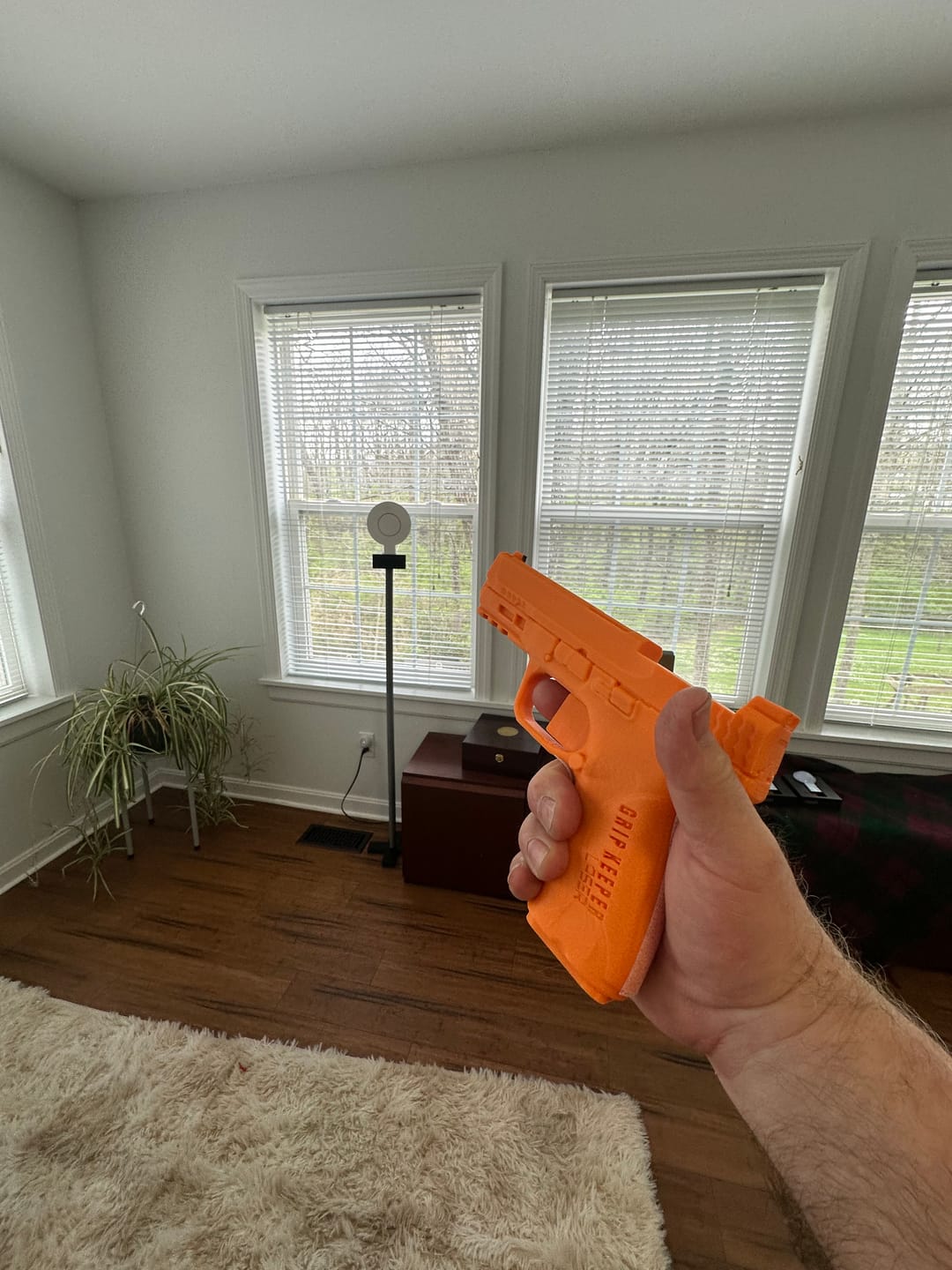 Customer photo review of Grip Keeper Laser Trainer – Trigger-Activated Laser Training Pistol