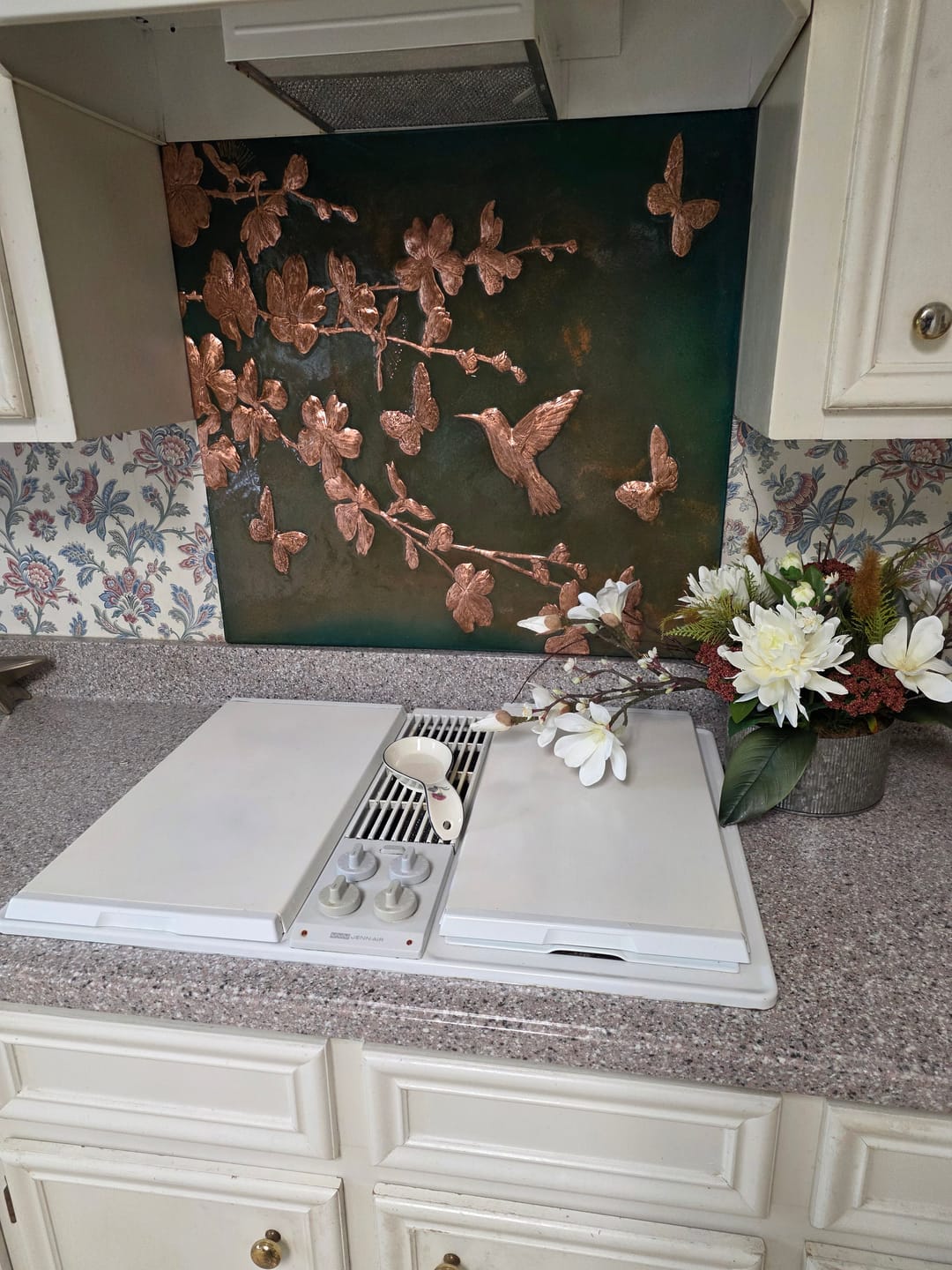 Customer photo review of Dogwood Branches Copper Backsplash Tile