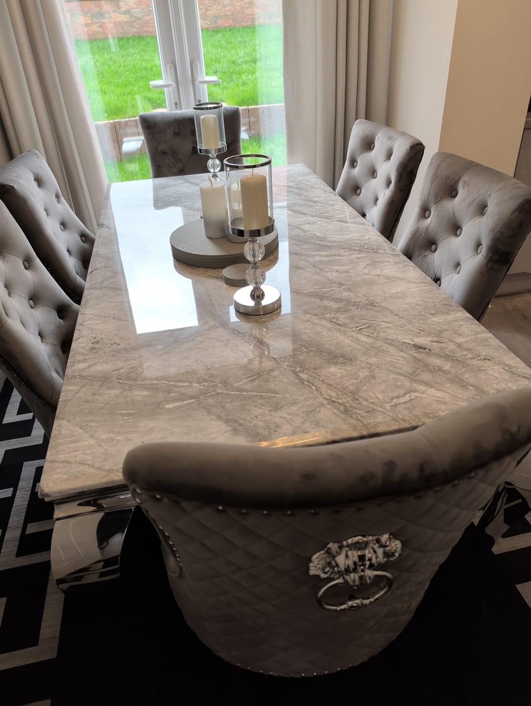 Customer photo review of Vienna Marble Dining Table With Bently Knocker Chairs lion