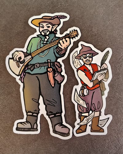 Reviewer's two custom stickers from the sale, showing illustrated fantasy characters with a white border.