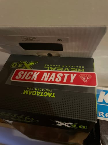 Customer's red and white Sick Nasty Decal shown on a black box.
