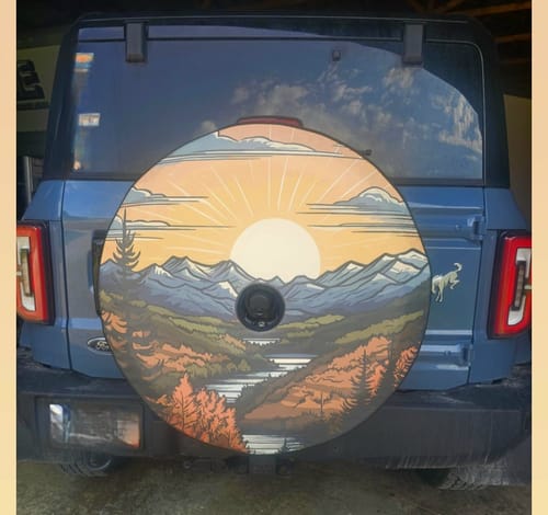 Customer photo review of Long Range Mountain Views Spare Tire Cover for Jeep, Bronco, RV, Camper, Trailer, & More