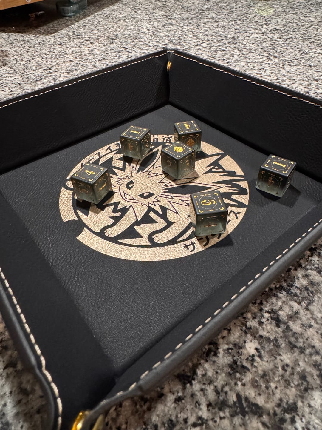 Customer photo review of Moonchild Black Frosted Glass D6 Dice Set