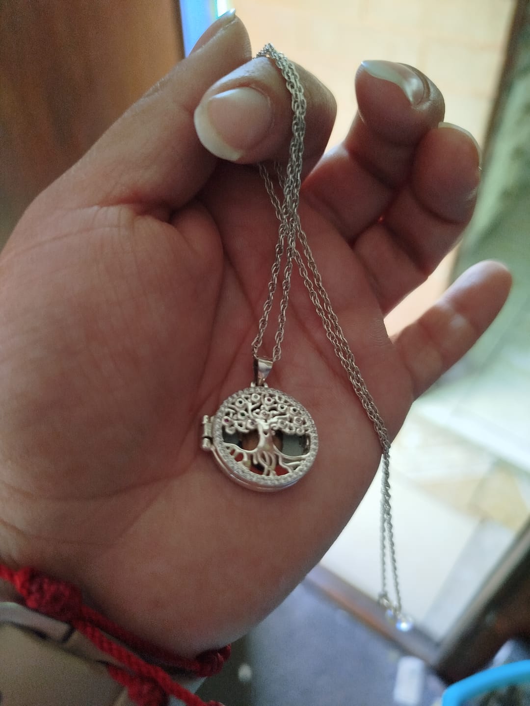 Customer photo review of Relicario Árbol de la vida