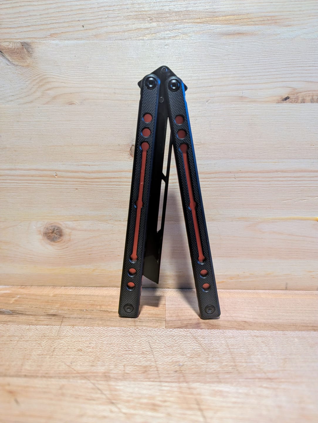 Customer photo review of Cold Blade Nautilus V2.5 Balisong Aluminum Alloy Handle Stainless Steel Fake Blade Bushing