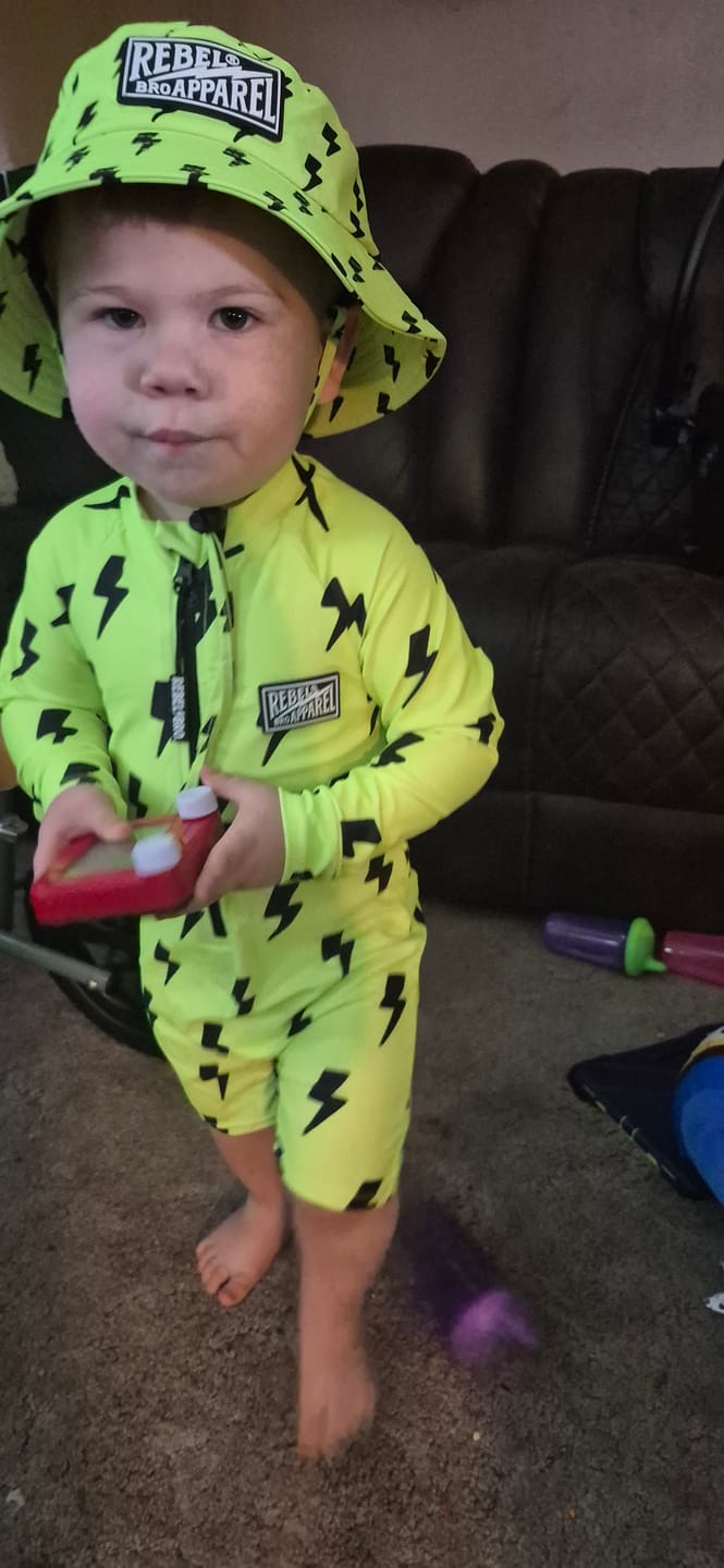 Customer photo review of UPF50+ Boys Swim Romper in Neon Electric Lime x Jagger