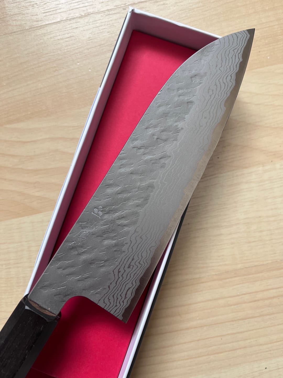 Customer photo review of Nigara Hamono Tsuchime Damascus Santoku 170 mm