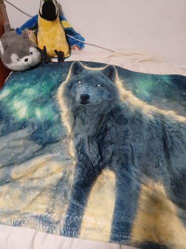 Customer photo review of White Wolf Standing in Snowy Forest Under Faint Glowing Northern Lights Cozy Fleece Sherpa Blanket