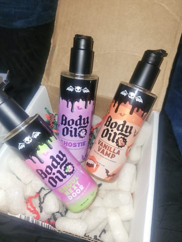 Customer's Vanilla Vamp Body Oil bottle shown with two other scents in a box.