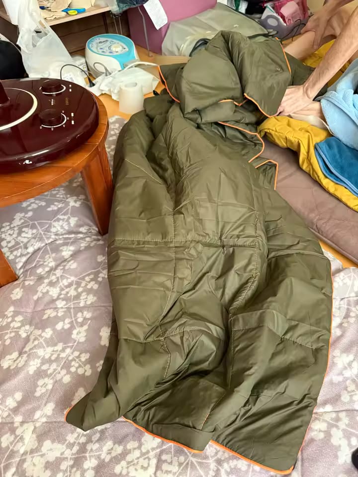Customer photo review of Ultralight Waterproof Camping Blanket Poncho – Wearable Quilt
