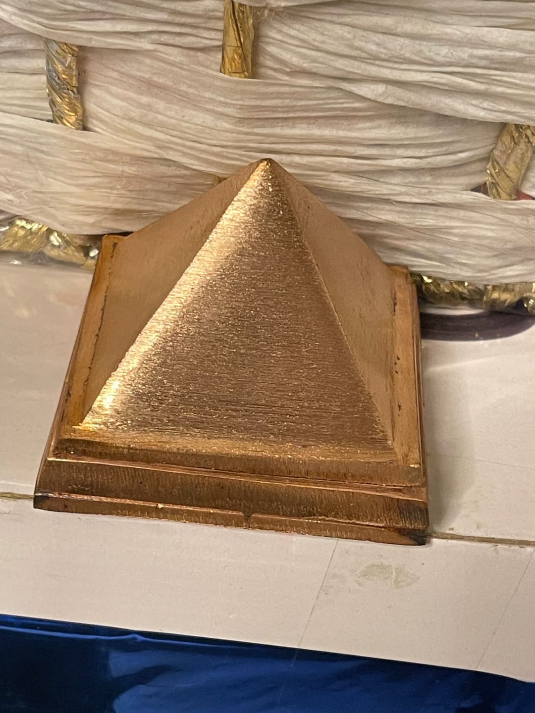 Customer photo review of 3-Layer Copper Pyramid Vastu Remedy for Energy Amplification, Prosperity and South East Direction Activation for Home, Office and Vastu Correction | 5-7.6 cm | 665 g