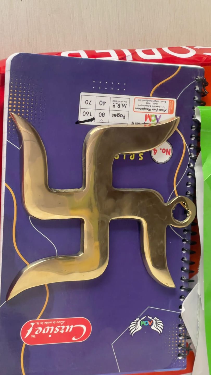 Customer photo review of Brass Swastik – Vastu Remedy for Home Protection | Main Door Dosh Nivaran | 6 & 9 Inch