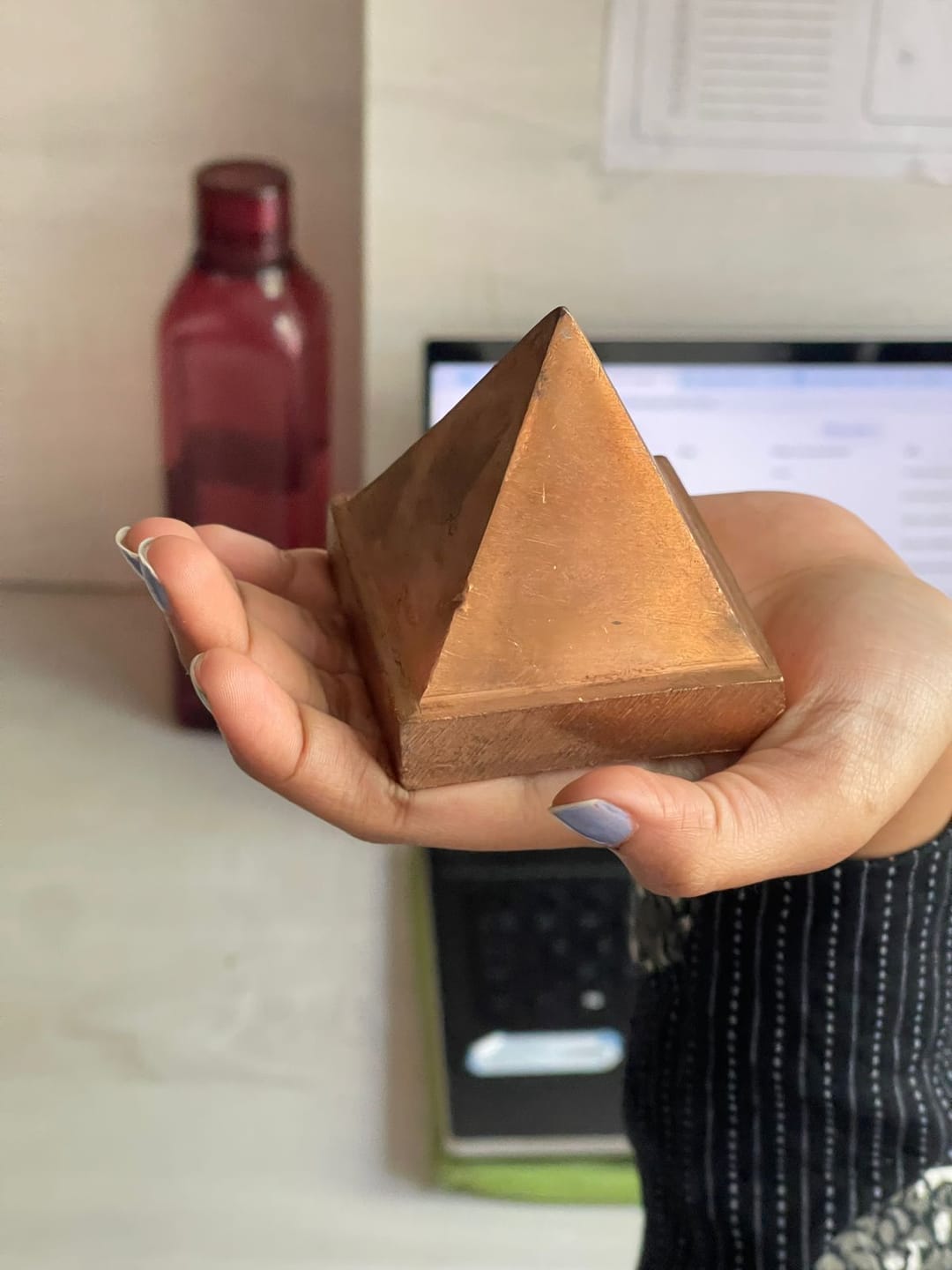 Customer photo review of Solid Copper Pyramid Vastu Remedy for Health, Wealth and Positive Energy Balance for Home Entrance, Main Door and Kitchen Placement | 7.6 cm | 850 g