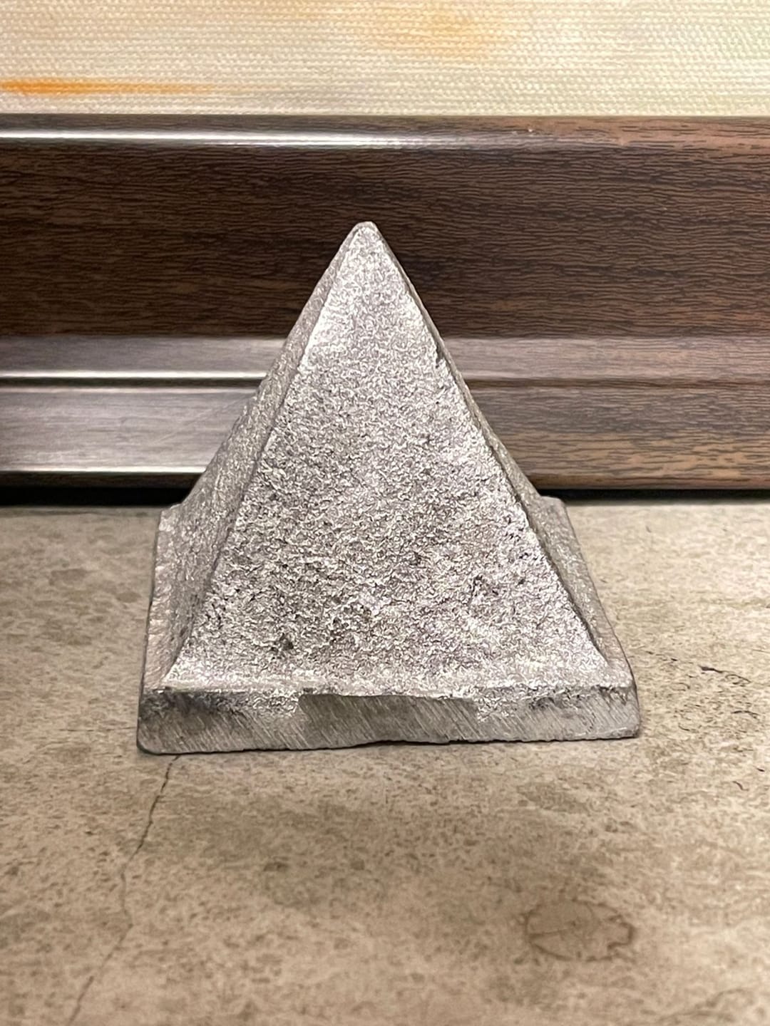 Customer photo review of Solid Iron Metal Pyramid Vastu Remedy for West Direction and Brahmasthan Balance, Mental Focus, Career Success and Positive Energy Correction | 7.6 cm | 800 g
