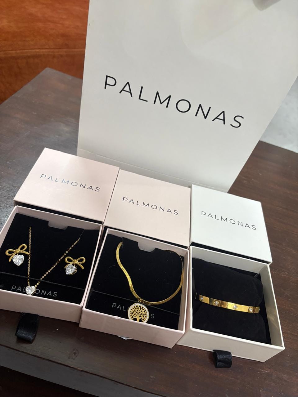 Customer photo review of Zircon Heart & Bow Drop Earrings
