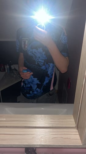 L.