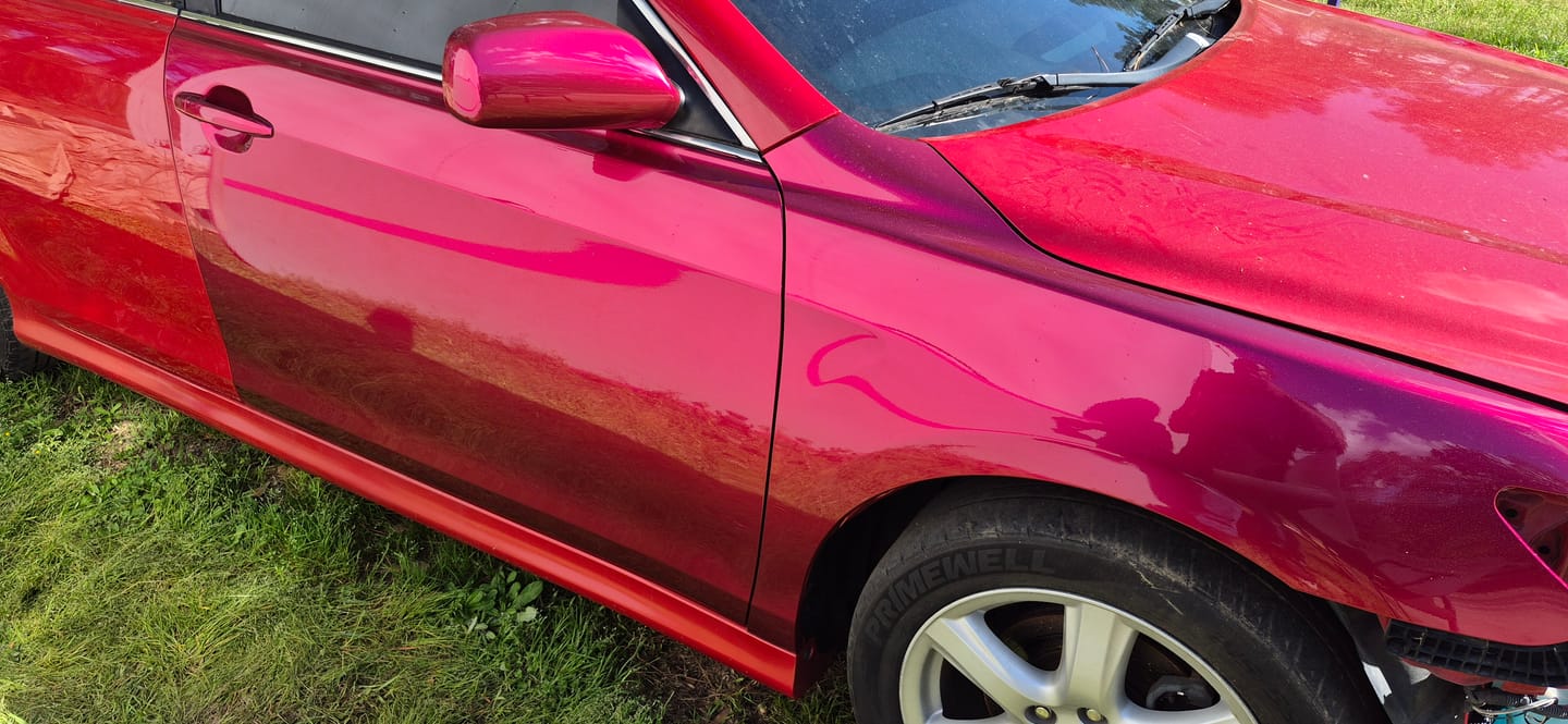 Customer photo review of Glossy Metallic Rubellite Purple Vinyl Wrap