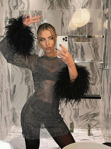 Customer photo review of Ava - Metallic Feather Mini Dress