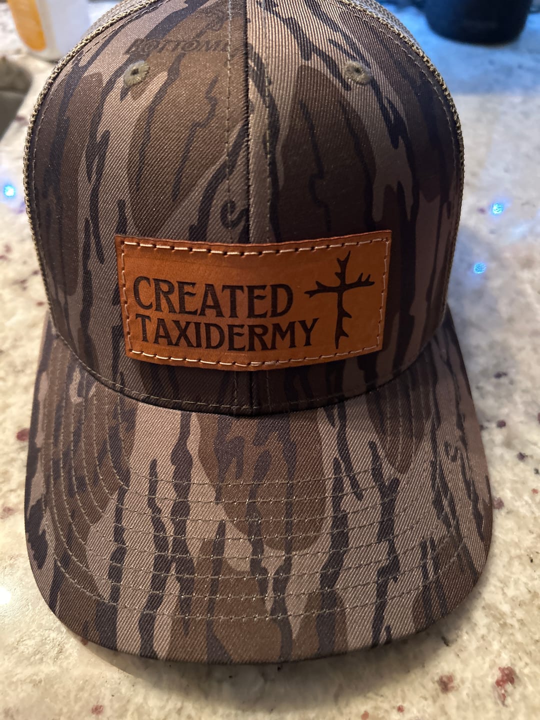Customer photo review of Camo Trucker 112 - Custom Leather Patch Hat