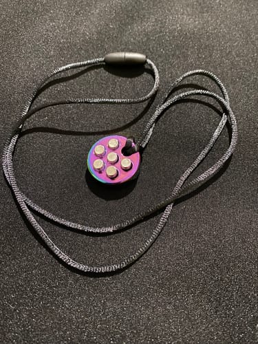 Customer photo review of Snowstorm  Necklace - Unisex Wearable Sensory Support