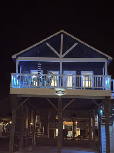 Customer photo review of Beach House Metal Sign