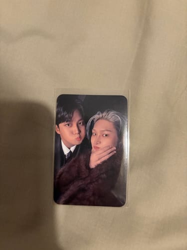 Customer's ATEEZ 'GOLDEN HOUR : Part.4' photocard showing two members posing together for a photo.