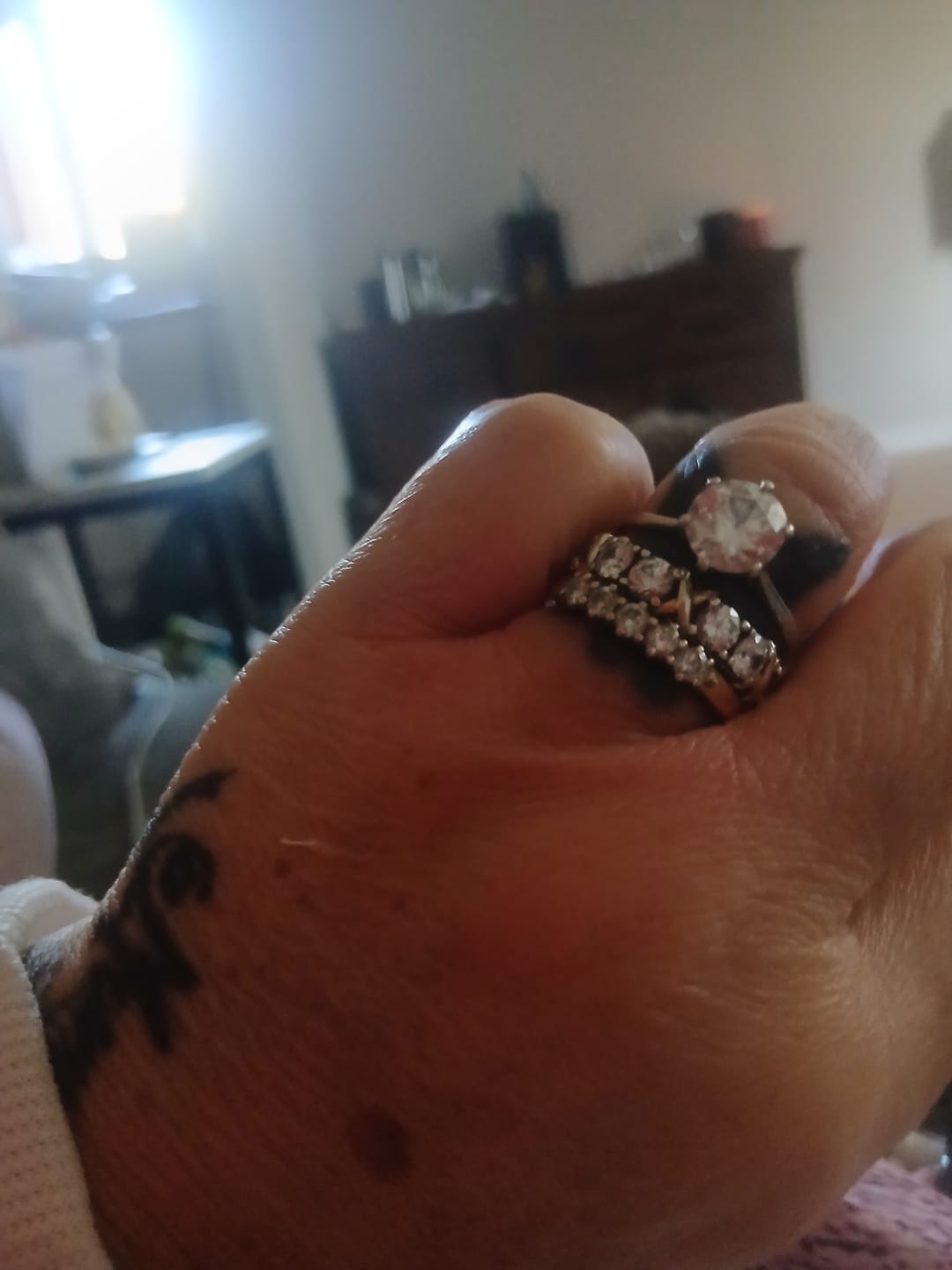 Customer photo review of White Gold 3ct Moissanite Golden Kisses Eternity Dazzle Ring