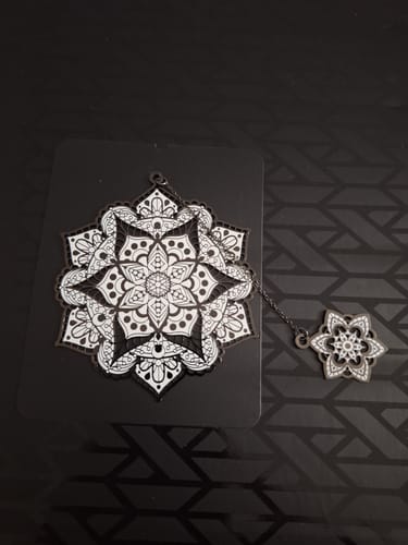 Customer's I Made It Bookmark on its backing card, showing the uncolored two-piece mandala design.