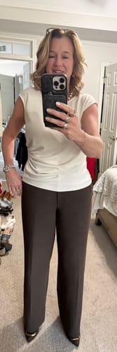 Reviewer wearing the ivory Brooke Definition Top, showing its fit and gathered waist detailing.