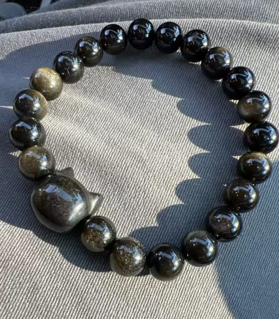 Customer photo review of Natural Gold / Silver Sheen Obsidian Cat Bracelet
