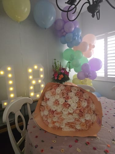 Customer photo review of Peach & White Rose Bouquet