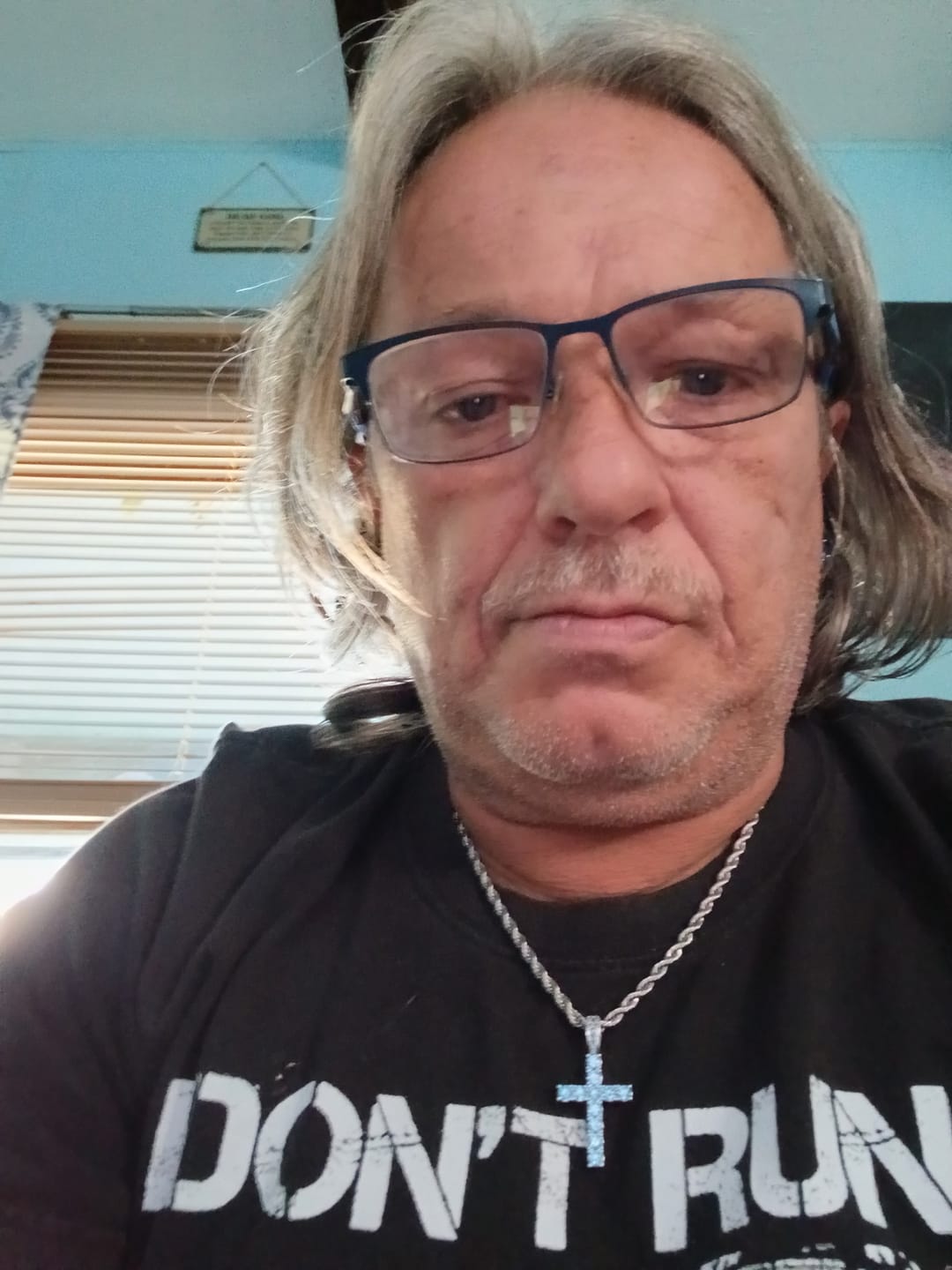 Customer photo review of Sapphire Cross Pendant - Blue