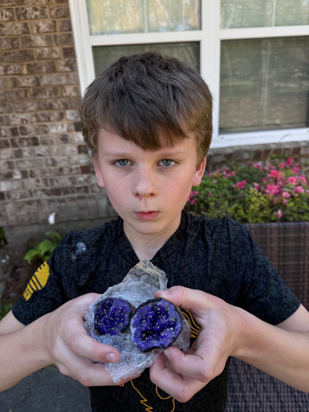 Customer photo review of Gallon Bucket of Quartz Geodes w/ One Colored Geode