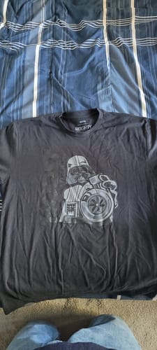 Reviewer's black BoostForce Shirt laid out flat, showing the grey graphic of Darth Vader holding a turbocharger.