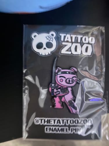 Customer photo review of Hiro the Pig Enamel Pin