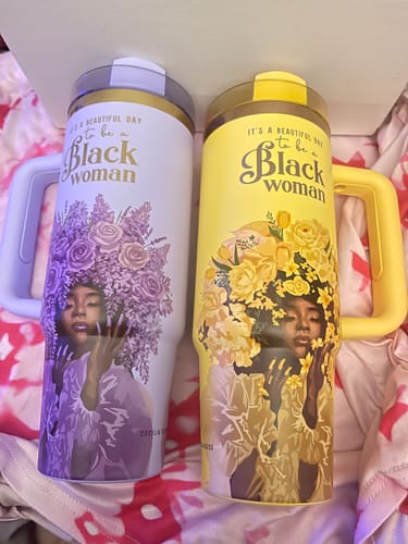 Customer's yellow Daffodil “Royalty Blossomed” Tumbler shown next to a purple version of the same design.