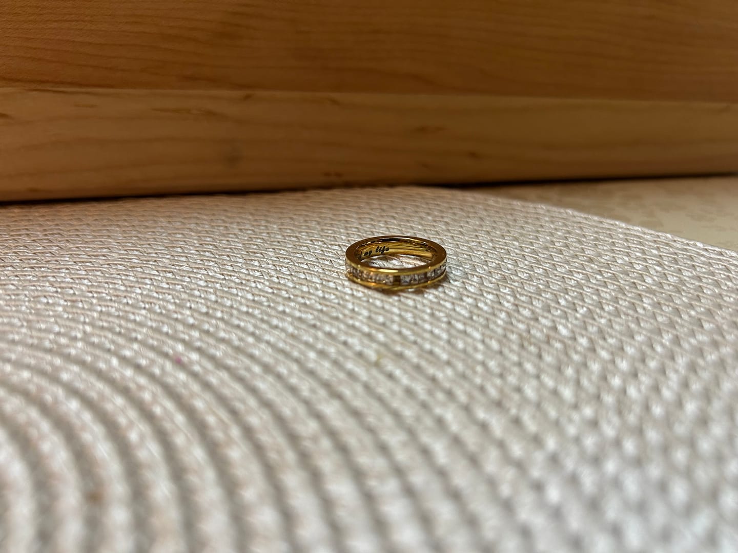 Customer photo review of 4MM 14k Gold Princess Cut Women's Eternity Titanium Ring Wedding Band with CZ