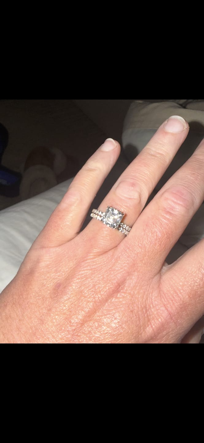 Customer photo review of S925 Half Halo Moissanite 0.5 Ct Round Cut White/Green Stone Anniversary Ring