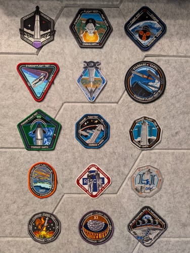 Customer's Artemis II Collectors Patch displayed with their full collection of space-themed patches.