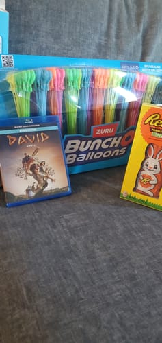 Customer's DAVID Blu-ray case shown with water balloons and candy as Easter gifts.