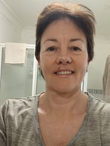 Reviewer looking happy and vibrant after using the 30-Day Detox Supplement.