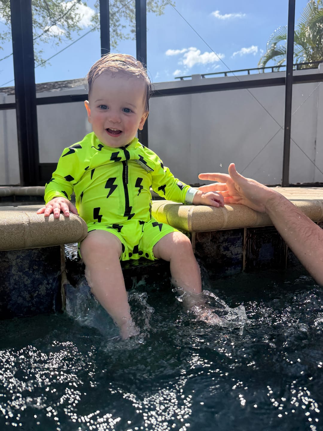 Customer photo review of UPF50+ Boys Swim Romper in Neon Electric Lime x Jagger