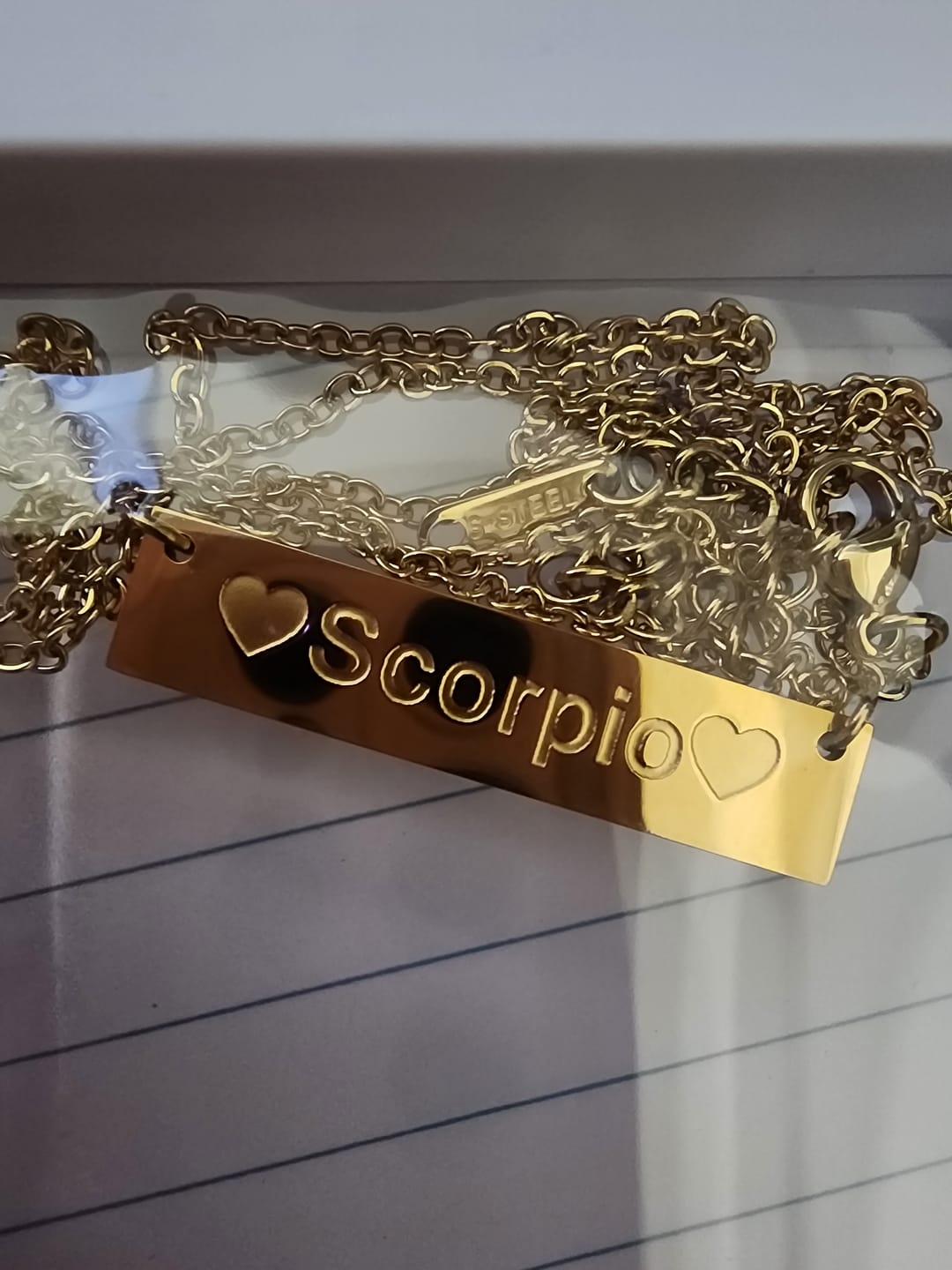 Customer photo review of Embossed Engraved Bar Necklace