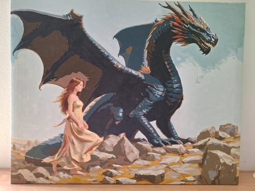 Customer's completed painting from a Custom Paint by Numbers Kit, showing a woman in a light dress beside a large dragon.
