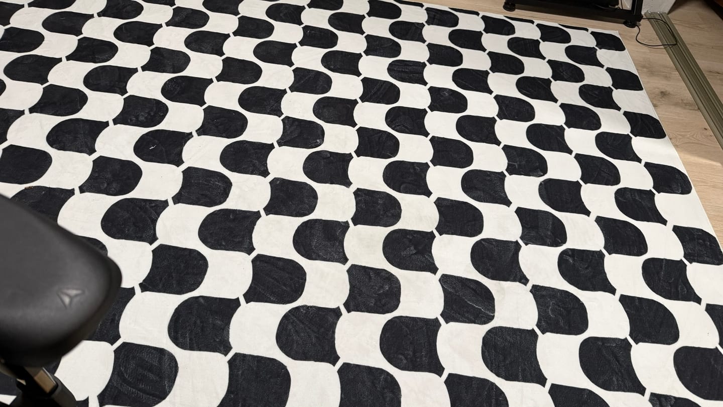 Customer photo review of Black and White Wavy Rug