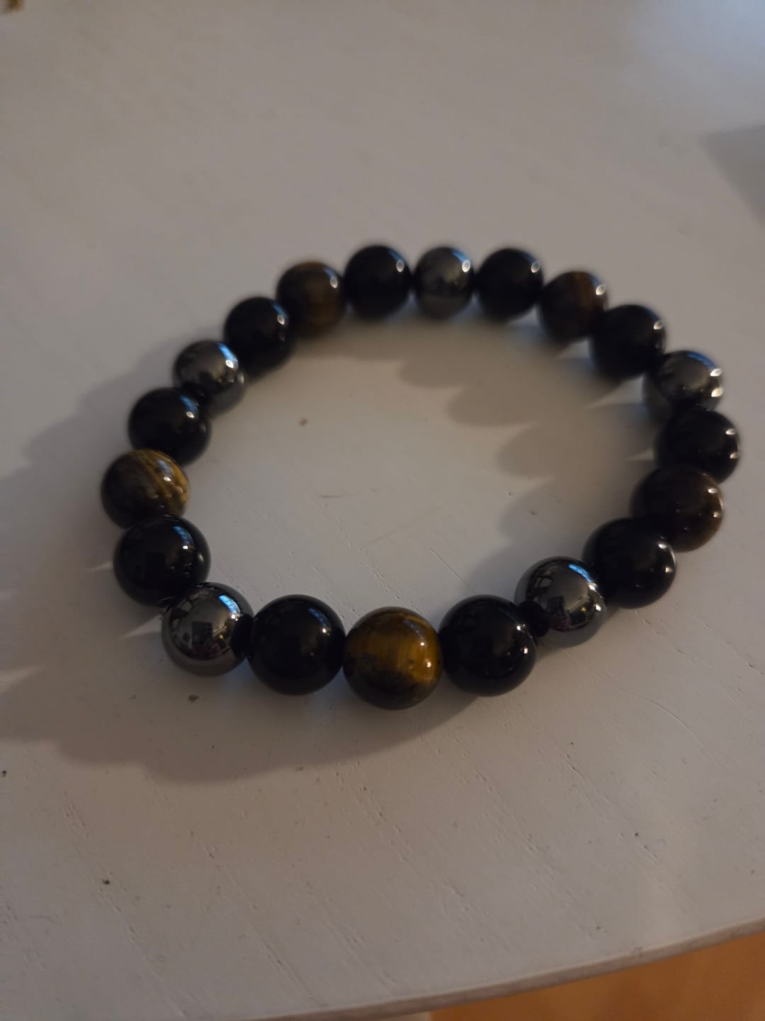 Customer photo review of DREIFACHER SCHÜTZER Tigerauge - Hämatit - Schwarzer Obsidian
