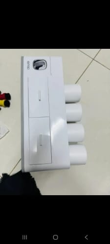 Customer photo review of Automatic Wall Mount Toothpaste Dispenser