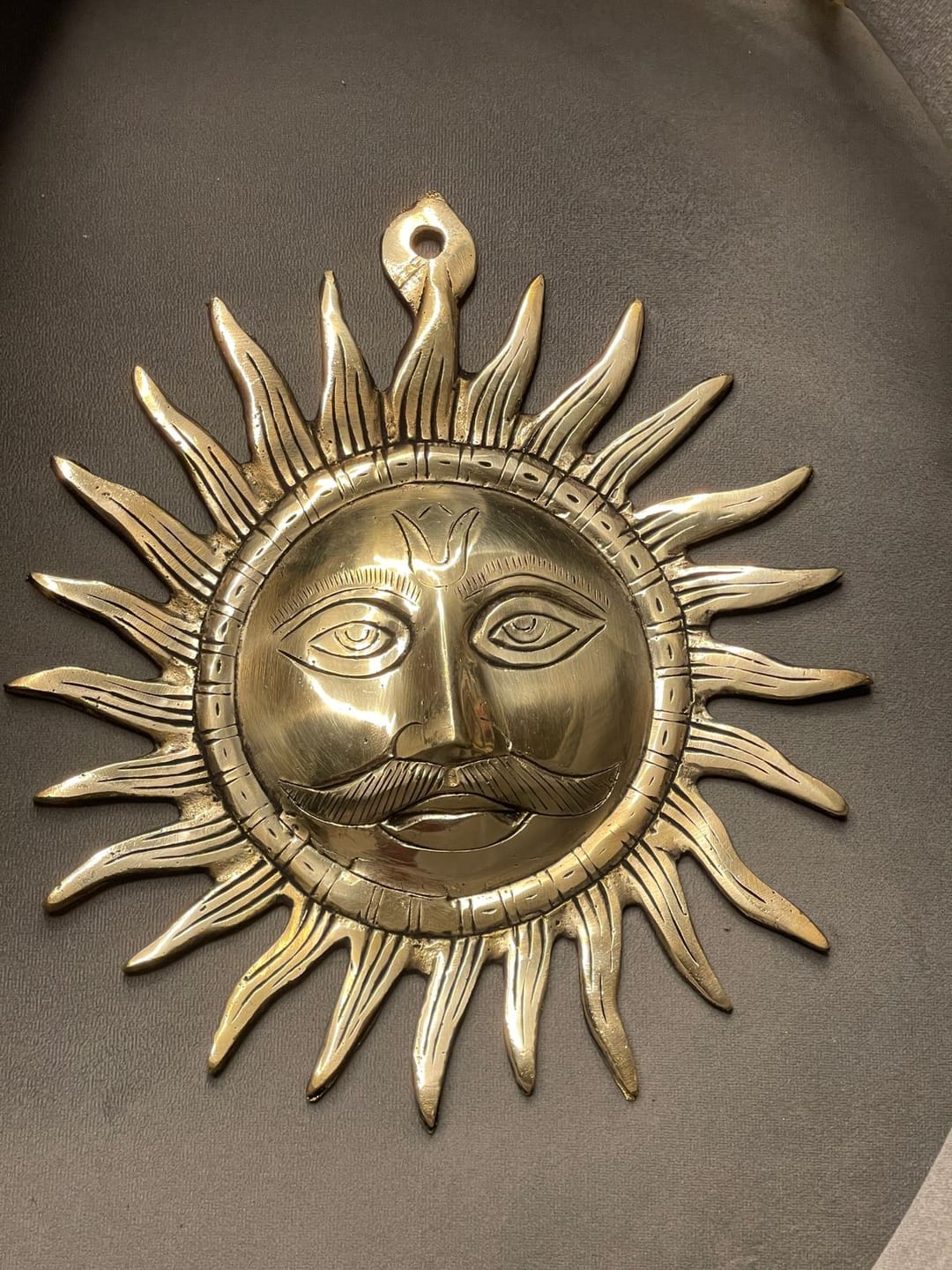 Customer photo review of Brass Surya (Sun) Ji Wall Hanging Idol Vastu Remedy for East Direction Balance, Fame and Positive Energy | 24 X 24 cm | 1 kg