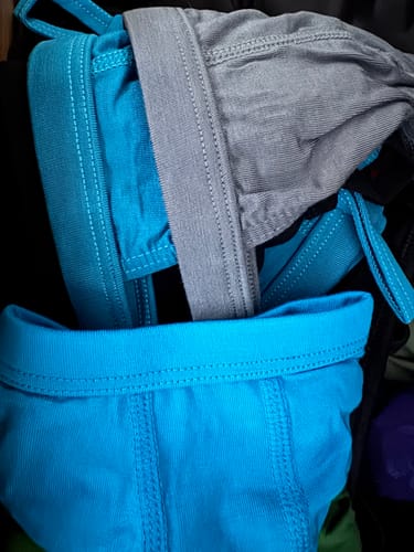 Customer's close-up of their cyan and grey Modal Thongs from the 3-pack.